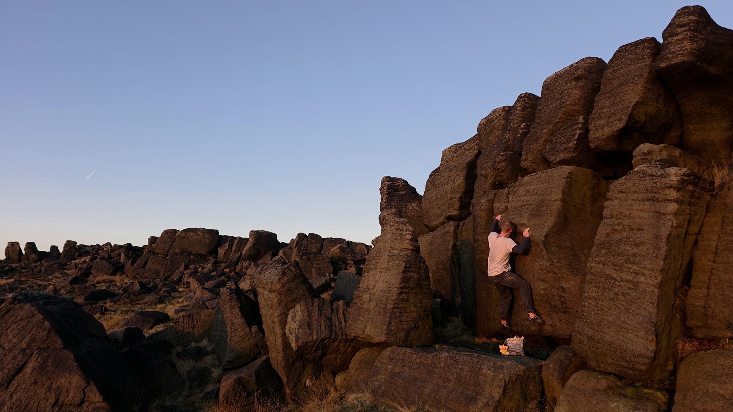 A picture of me climbing Naomi's Wall at Blackstone Edge