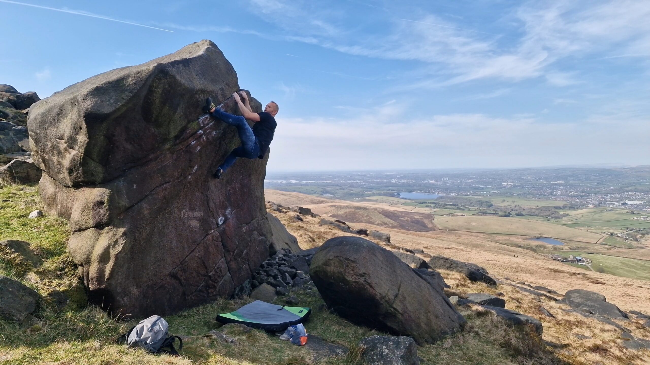 A picture of me climbing Concavity Cons Gravity at Blackstone Edge
